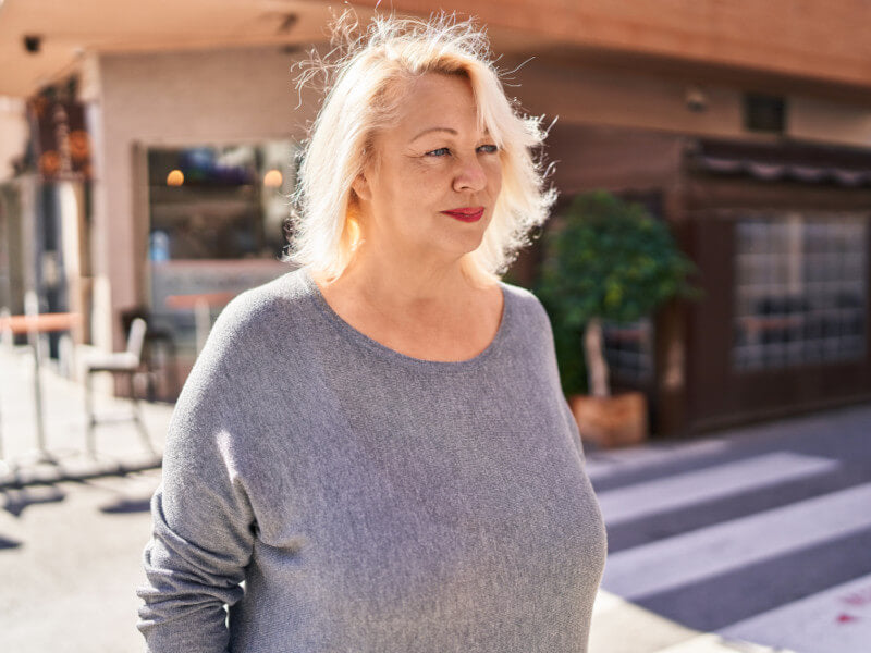 Middle aged woman with belly fat