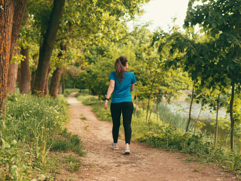 Woman walking to burn calories