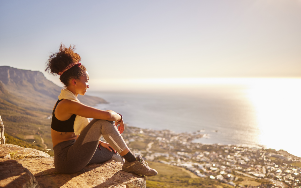 woman sitting after hike