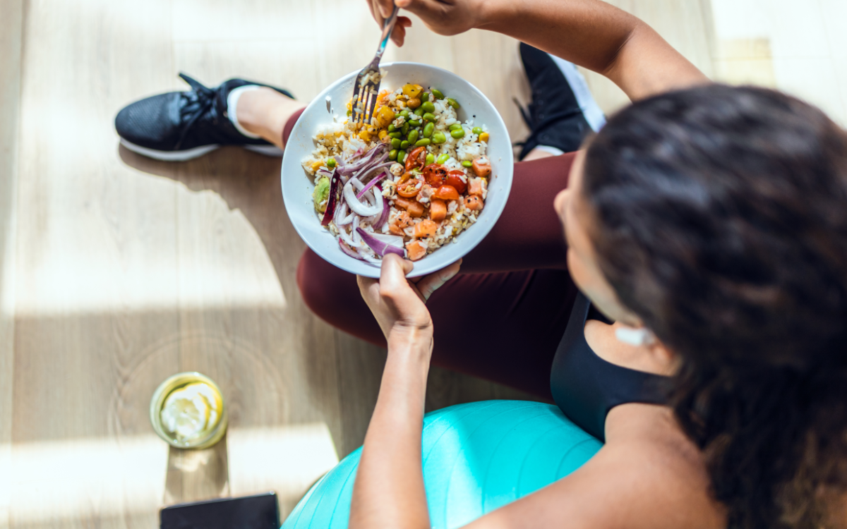 woman eating salad
