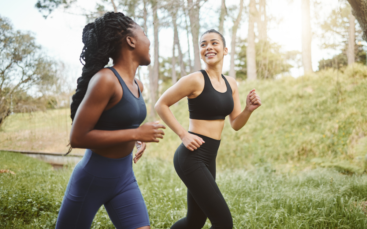 two women running together